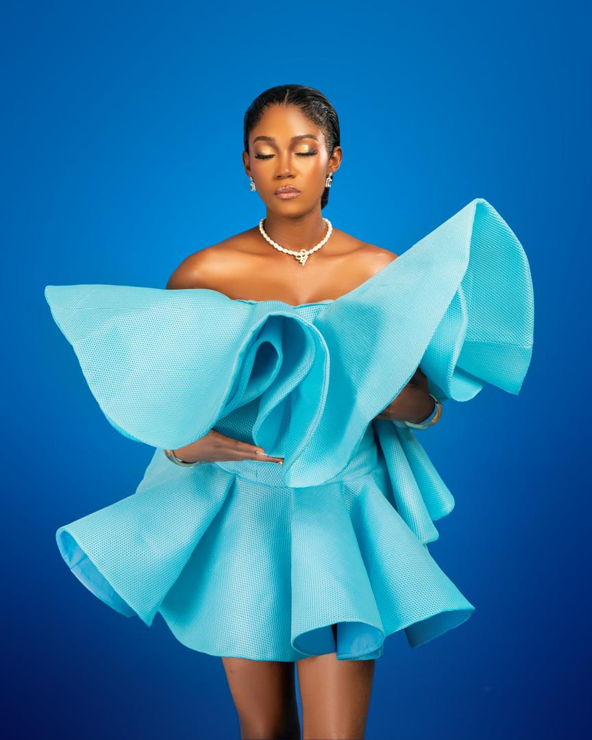 Cyan ruffled sculptural statement dress