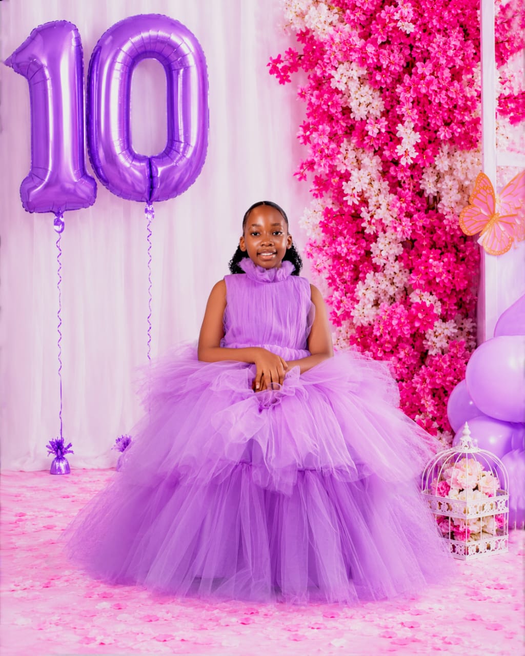 Girl in a lavender tulle gown at her tenth birthday shoot