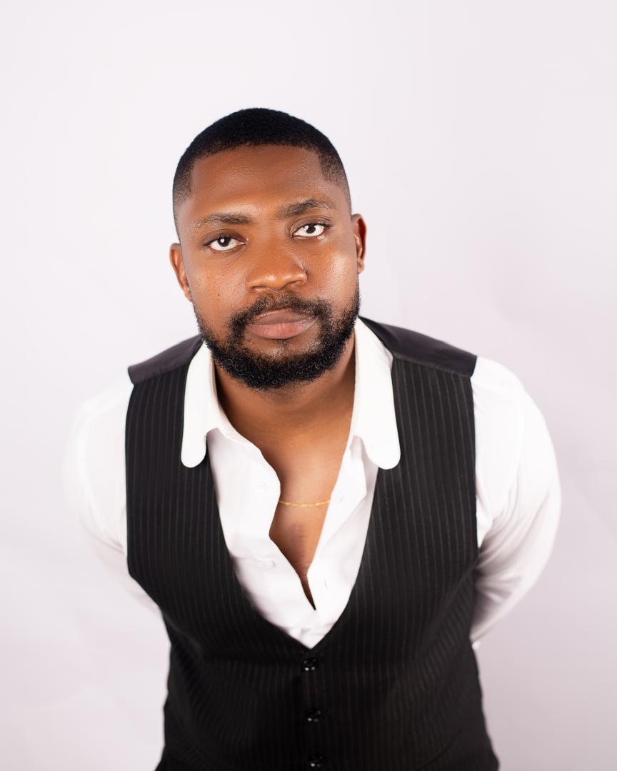 Editorial portrait in a pinstripe vest